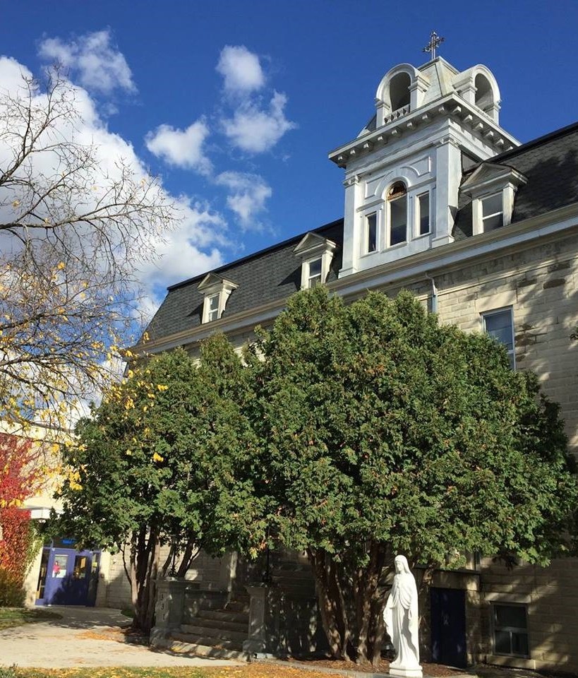 SCCS School building with Mary statue