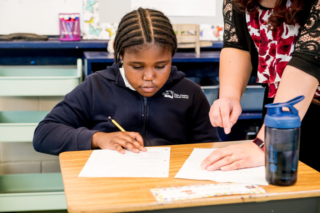 SCCS student & teacher in classroom